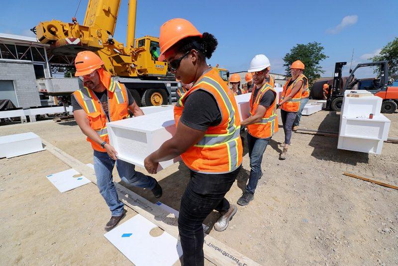Students work on a construction project